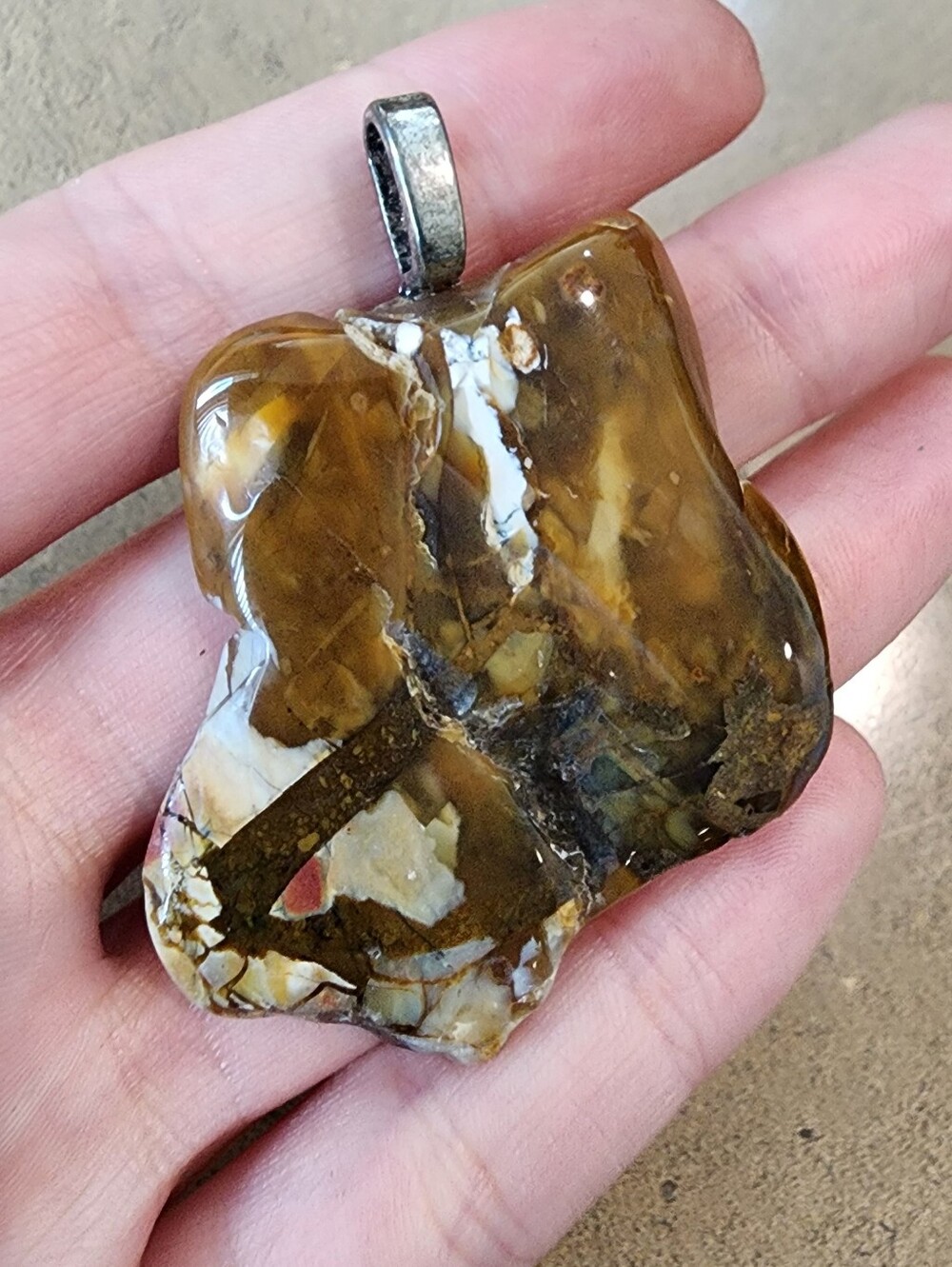 Polished Brown and Cream Pendant with Silver Bail